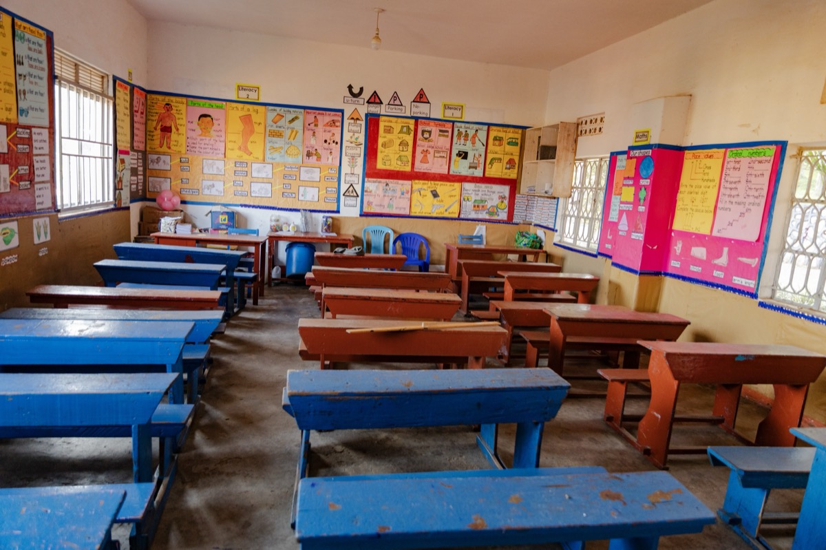 A colourful classroom with charts on the walls
